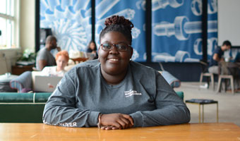 image of young lady at desk